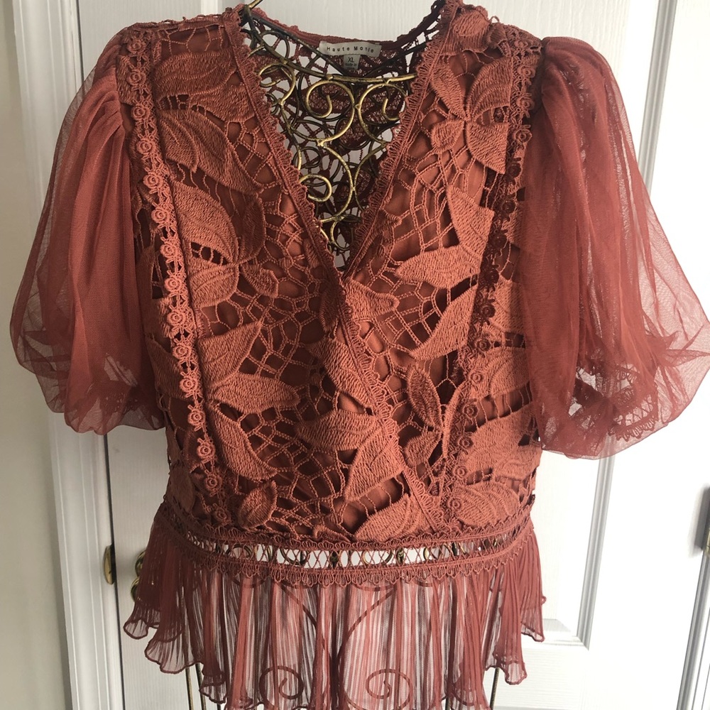 Peplum style top with puff sleeves